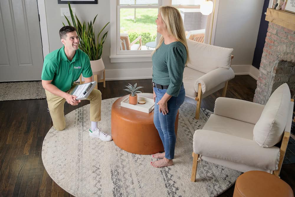 Quick-Dry technician cleaning an area rug inside a home in Algonquin, IL