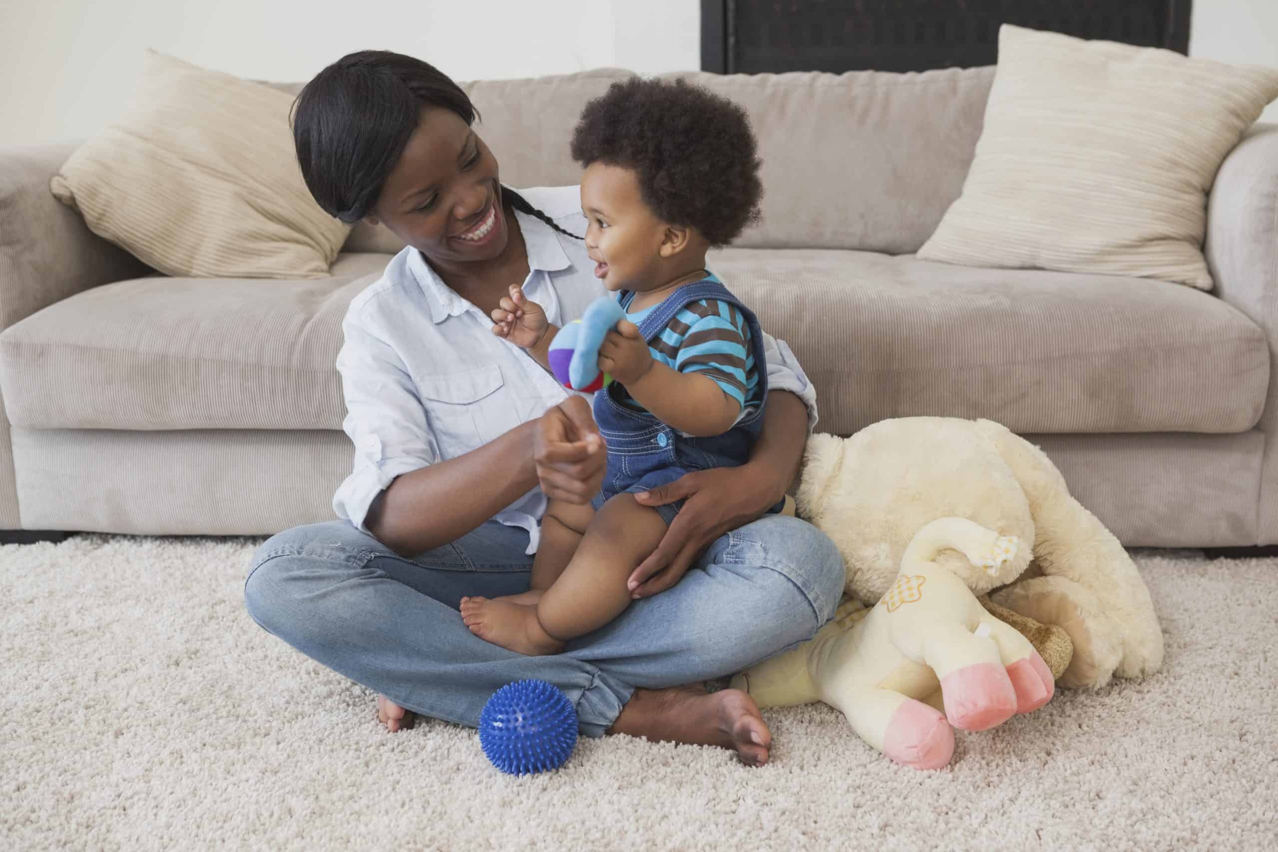 Technician performing professional carpet cleaning in a Lake County home